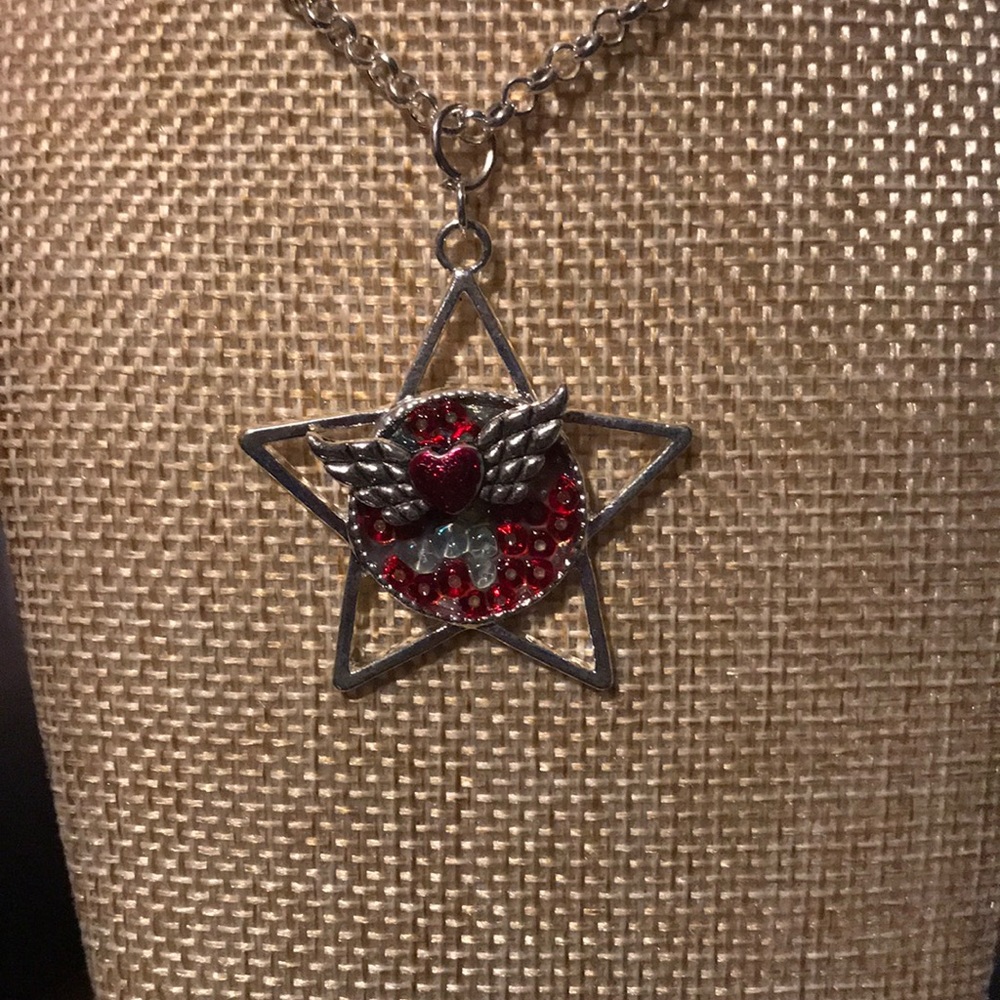 Star pendant on 24” Rollo chain